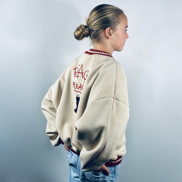 SOOI SWEATER TEACH PEACE